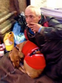Close-up of man with dog