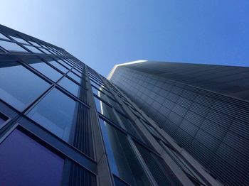 Low angle view of modern building against clear sky