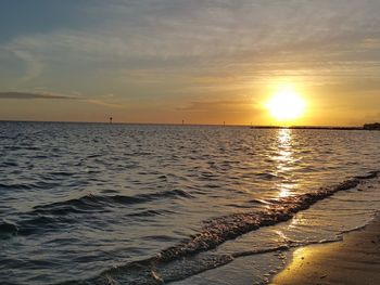 Scenic view of sunset over sea