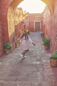 Young tourists dancing in santa catalina monastery, convento de santa catalina, arequipa