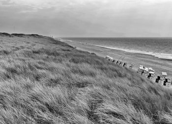 Scenic view of beach against sky