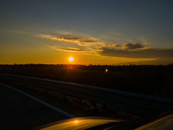 Road against sky during sunset