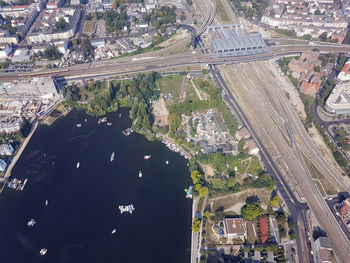 High angle view of street amidst trees in city