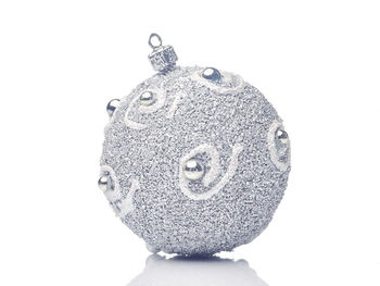 Close-up of decoration against white background
