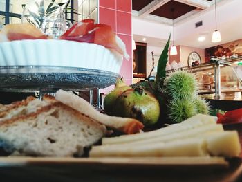 Close-up of fruits in plate on table