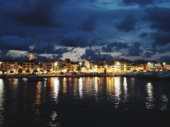 View of illuminated city at dusk