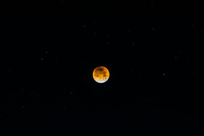 Scenic view of moon against sky at night