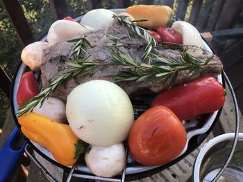 High angle view of fruits and vegetables on cutting board