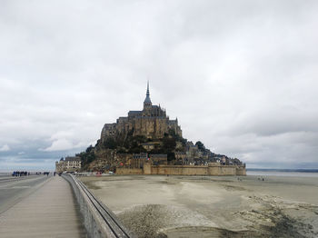 View of temple building against sky