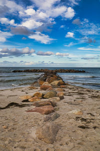 Scenic view of beach against sky