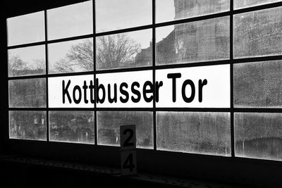 Low angle view of man standing on wall