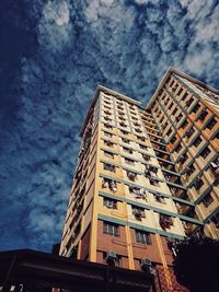 Low angle view of skyscraper against sky