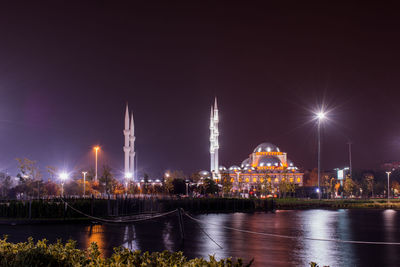 View of illuminated city at night