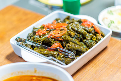 Turkish and arabic traditional ramadan food stuffed grape leaves with rice and meat, sarma with