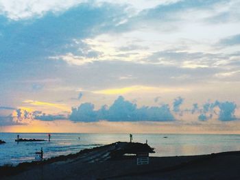 Scenic view of sea at sunset