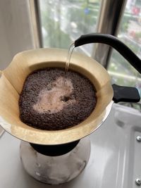 High angle view of coffee cup on table