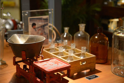 Close-up of wine bottles on table