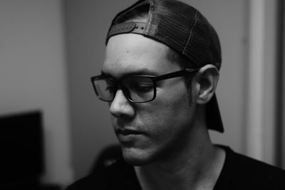 Black and white portrait close-up of young man