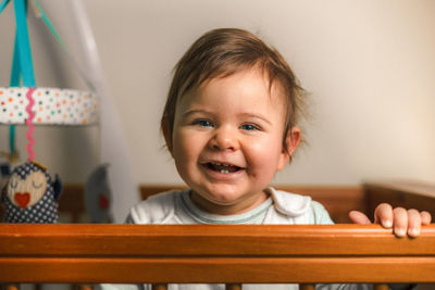 Portrait of cute smiling boy at home