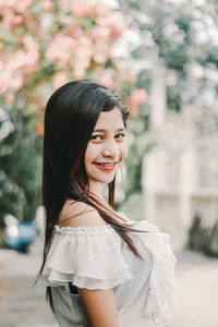 Portrait of a smiling young woman