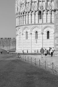 Group of people in front of historical building