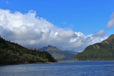 Scenic view of cloudy sky over mountains