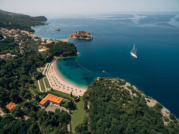 High angle view of sea and trees