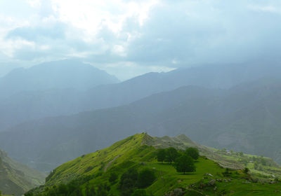 Scenic view of mountains against sky