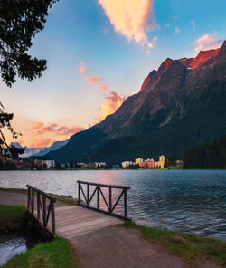 Scenic view of lake against sky during sunset