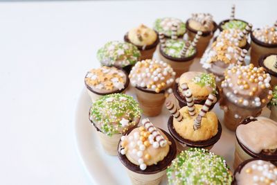 High angle view of cupcakes on table