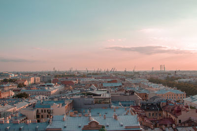 High angle view of townscape against sky at sunset