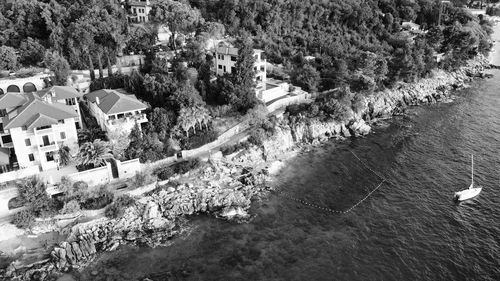 High angle view of townscape by sea