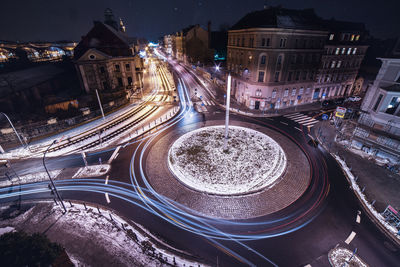 High angle view of light trails on road in city