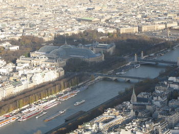 High angle view of river amidst buildings in city