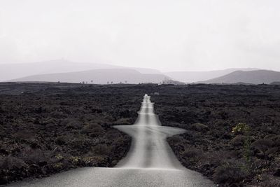 Scenic view of land against sky