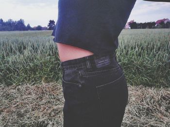 Woman standing in field