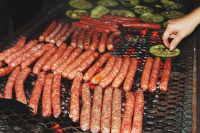 Sausages on open grill