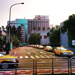 Cars on road in city