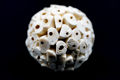 Close-up of ice cream over black background