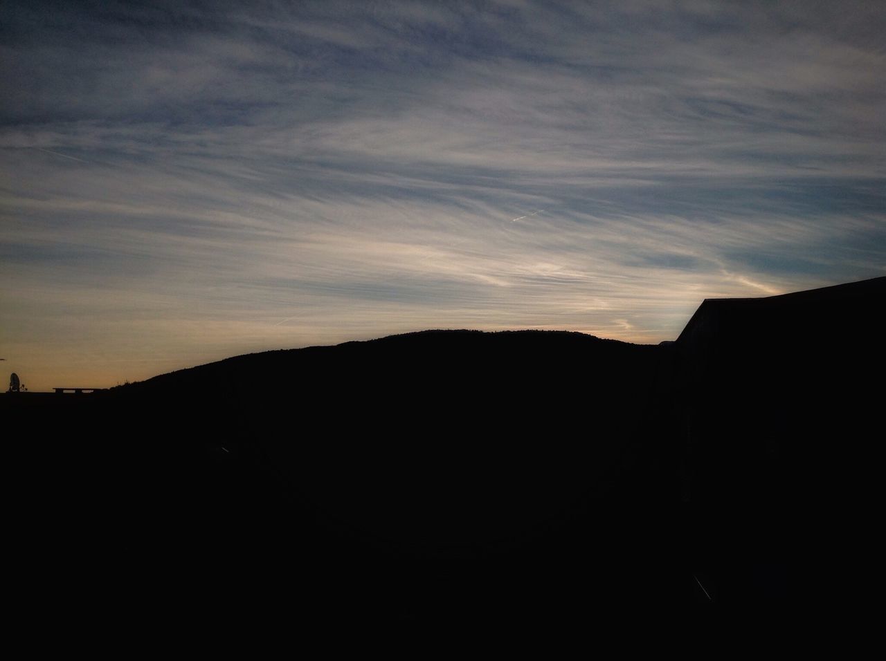 silhouette, mountain, tranquil scene, scenics, tranquility, dusk, dark, sky, beauty in nature, nature, mountain range, outline, outdoors, calm, physical geography, no people, remote, majestic, back lit, non-urban scene