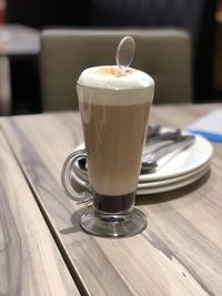 Close-up of coffee cup on table