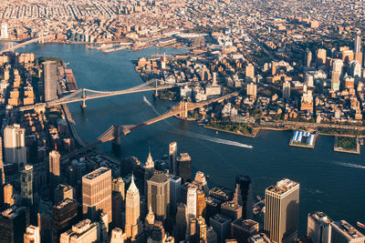 High angle view of river and buildings in city