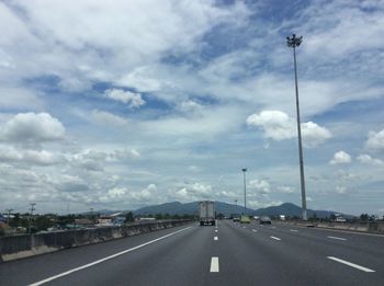 Road in city against sky