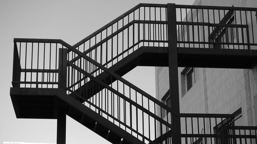 Low angle view of staircase of building against sky