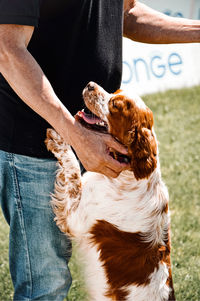 Man with dog outdoors