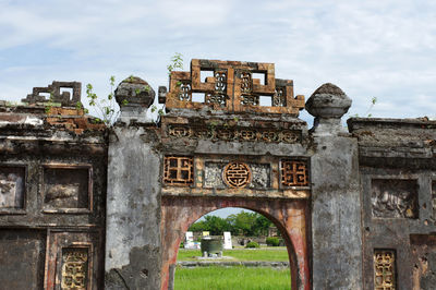 View of historic building against cloudy sky