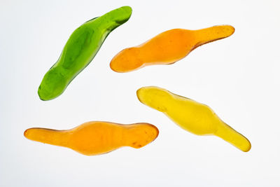 Close-up of yellow chili pepper against white background