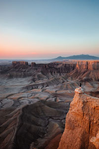 Scenic view of landscape against sky during sunset