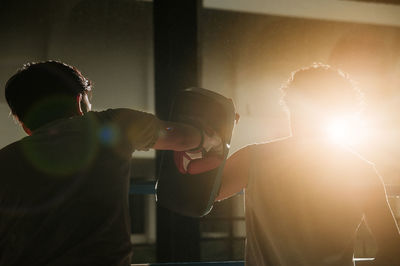 Two people on box training