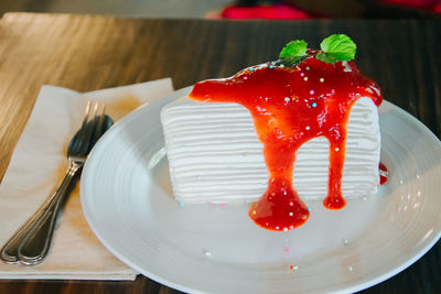 Close-up of cake in plate on table